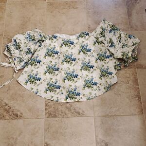 1st Sight open shoulder top with floral design